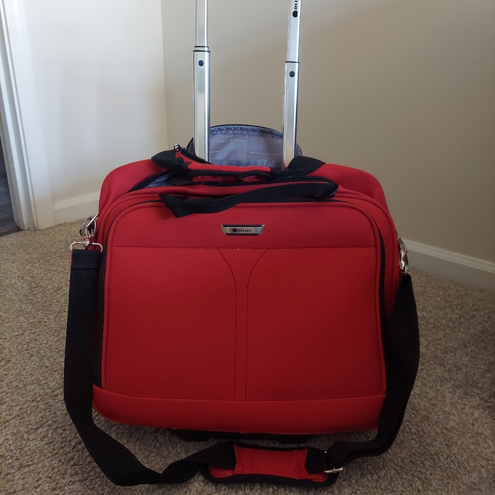 Delsey red laptop roller bag